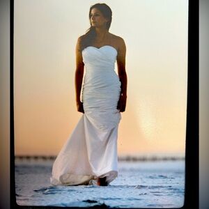 Mermaid style wedding dress with sweetheart neckline.  Comes with veil & shawl.